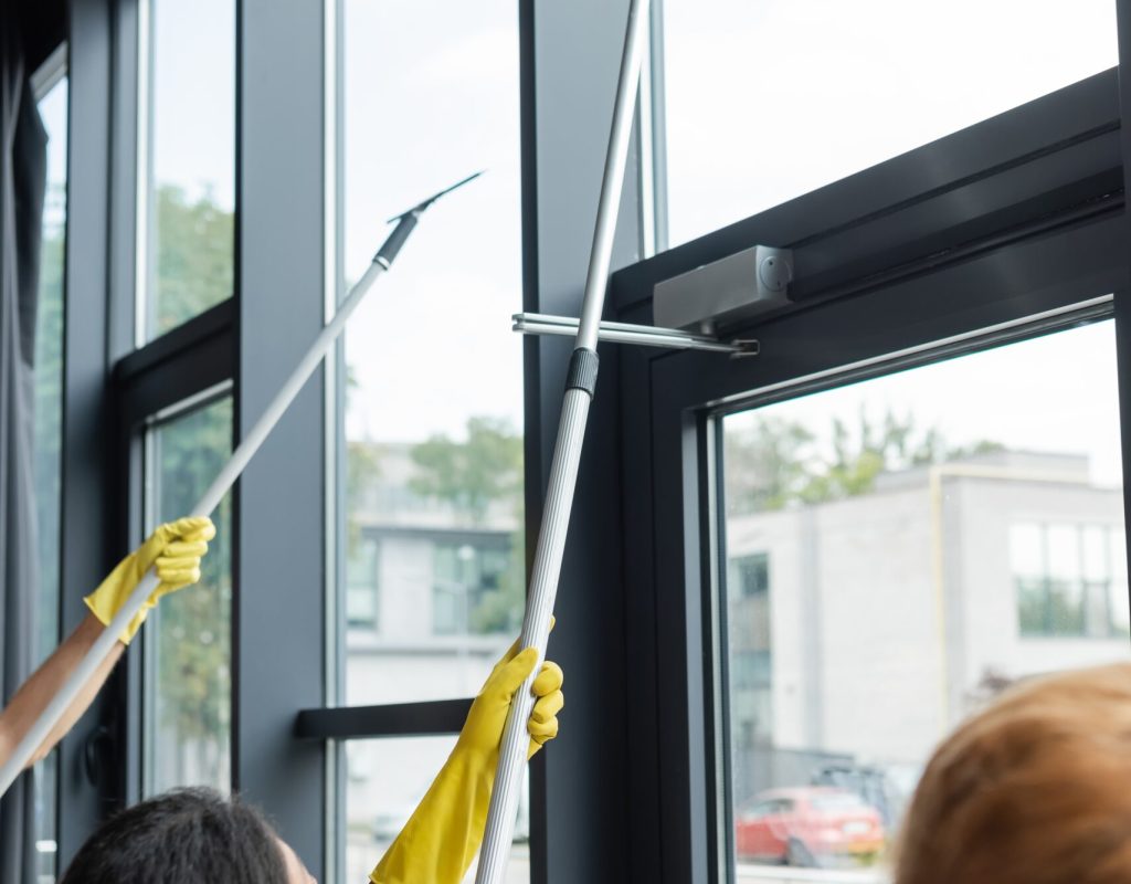 Professional,Cleaners,In,Rubber,Gloves,Cleaning,Large,Panoramic,Windows,In